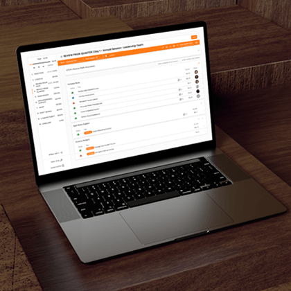 A laptop featuring a screenshot of the Ninety Meeting tool