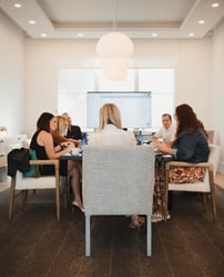coworkers in quarterly planning meeting
