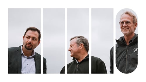 Three members of a senior leadership team standing outside, posing for a picture.
