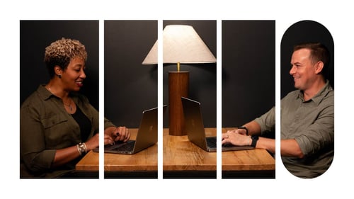 Two employees working in the Ninety app having a meeting together.
