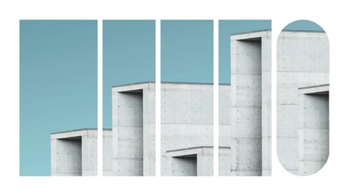 Buildings next with a blue sky behind them