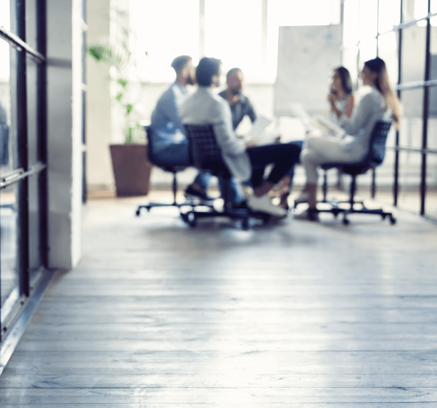 A group of employees having a meeting.