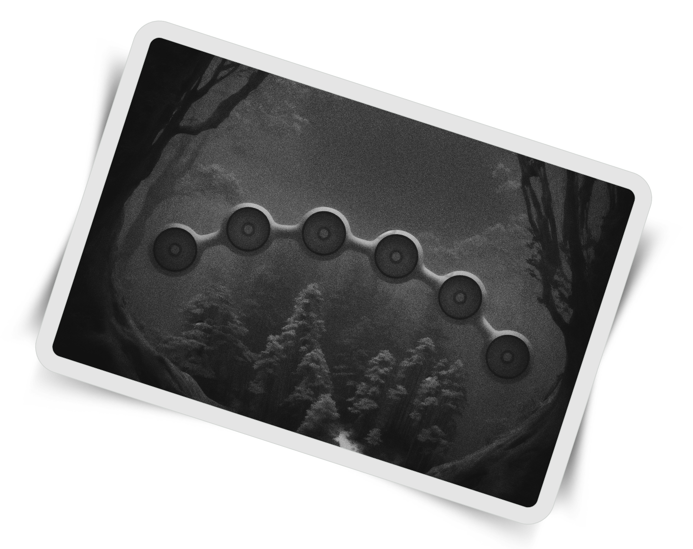 A black and white scene of a dense forest at night with tall trees. At the center is an arched, horizontal chain of six circular, speaker-like objects connected by smooth curves, appearing to float slightly above the forest floor.