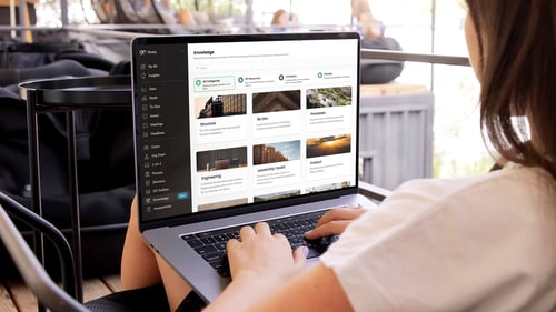Person using the Ninety Knowledge Portal as their team's knowledge base on a computer.