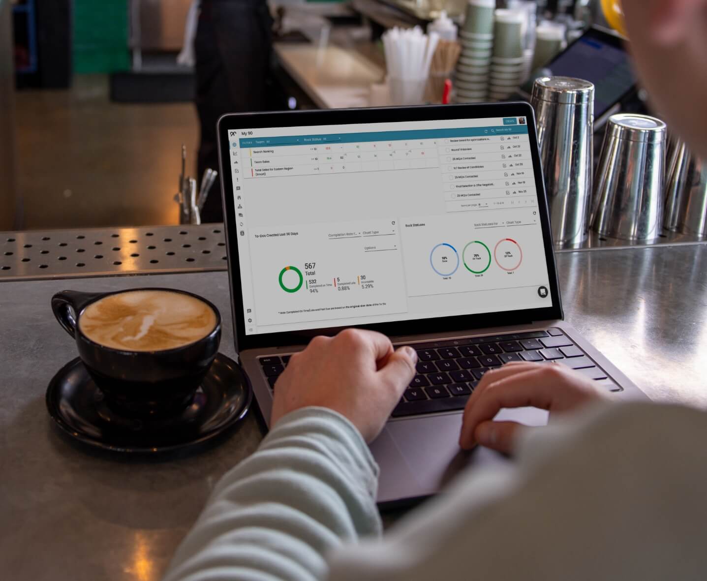 An individual using the Ninety app on their laptop.