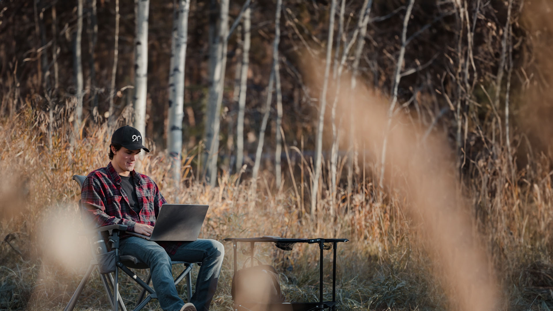 Team Ninety member working remote in the woods or garden