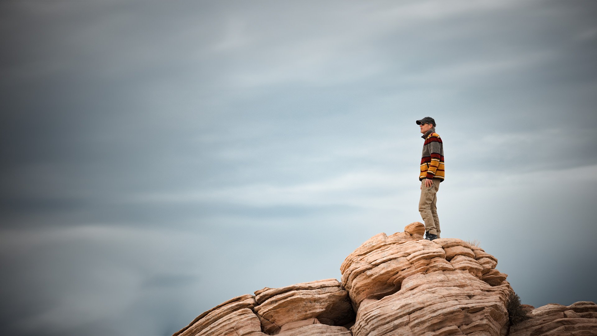 Blog co-author Mark Abbott standing atop a rock formation, looking into the distance.