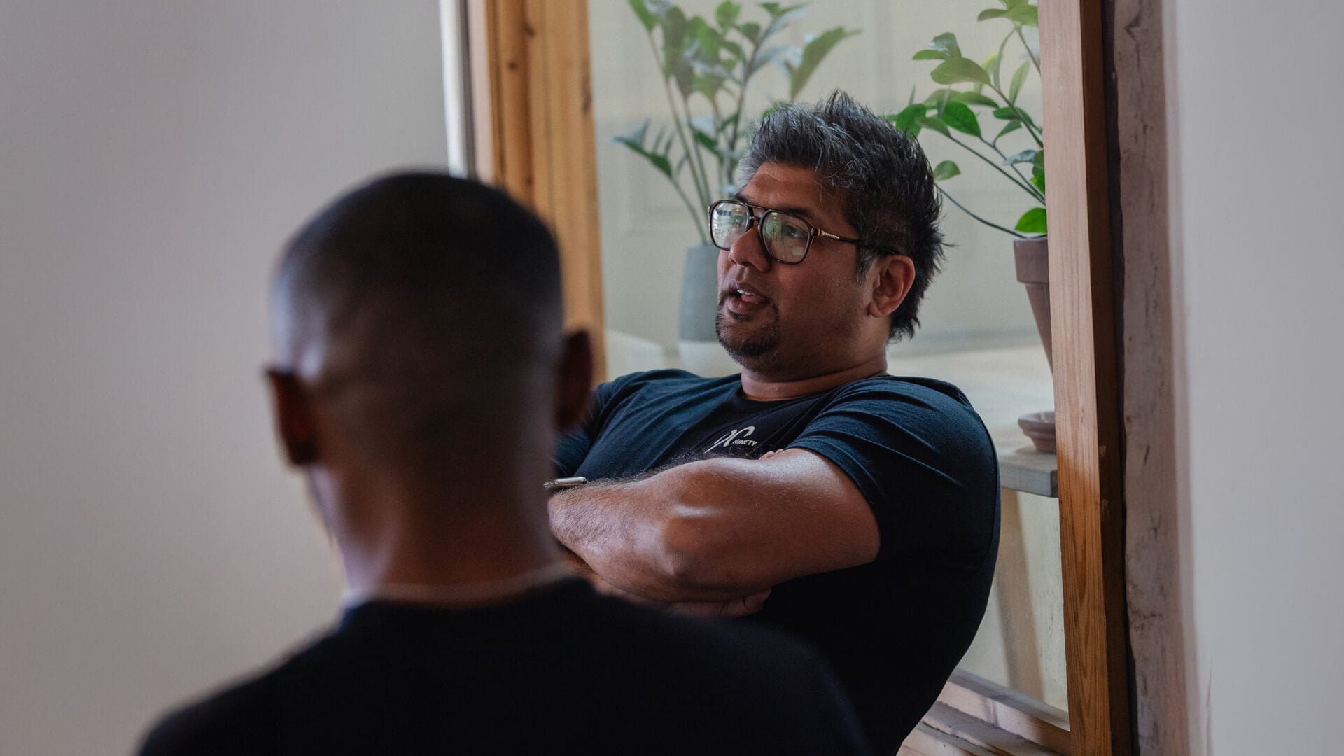 A man sitting down with his arms folded while conversing. Leadership teams don't struggle to find issues. They struggle to solve them. Learn how to turn IDS® conversations into decisions that create lasting change.